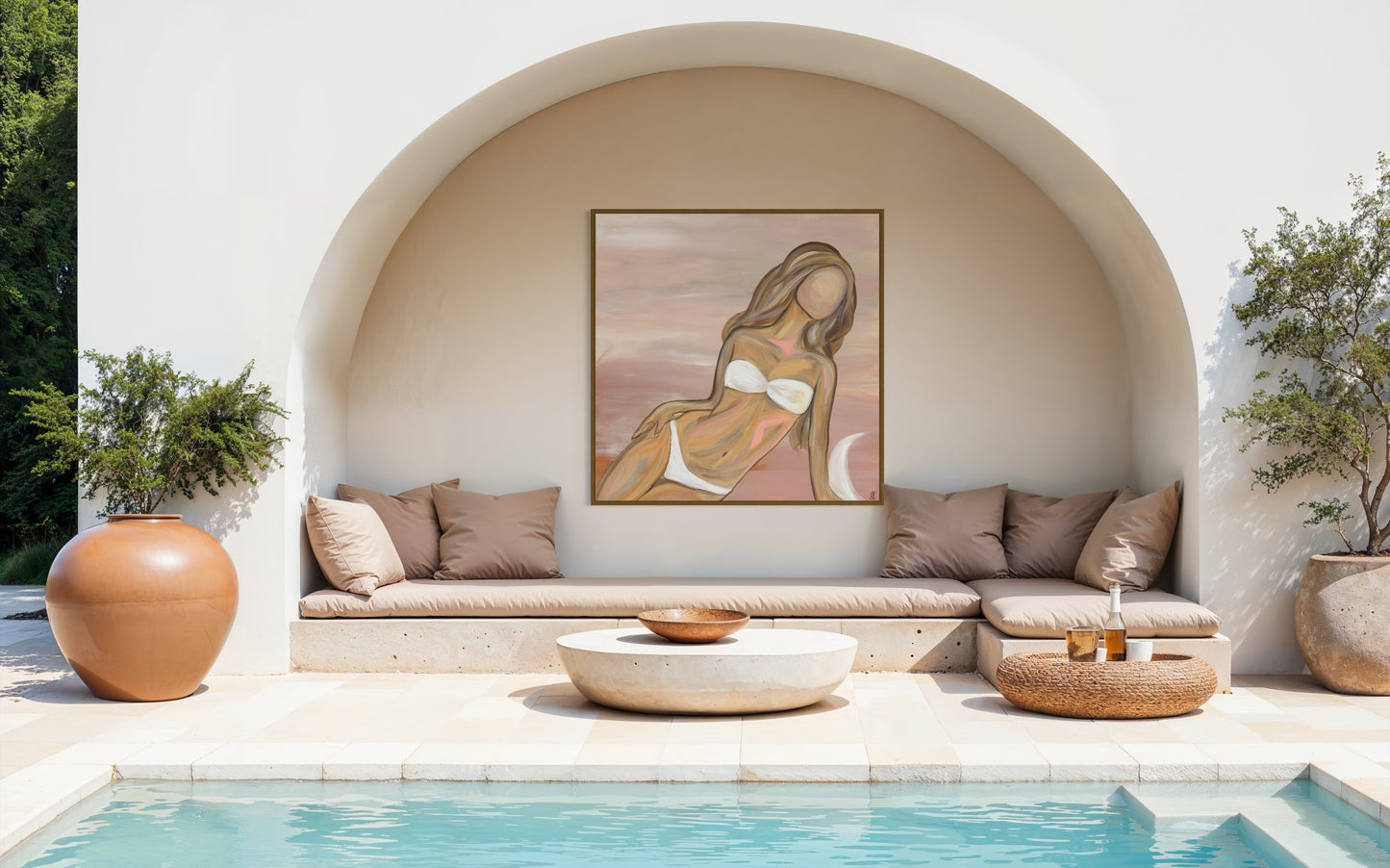Outdoor seating area with a pool, decorative wall art, and potted plants. Jade Fairbairn Art
